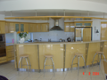 Silver Ash veneer kitchen with timber veneer light bulkhead