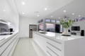 Black & white gloss 2pak kitchen with white benchtops