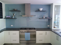 'Floating' 2pak painted shelves on glass splashback